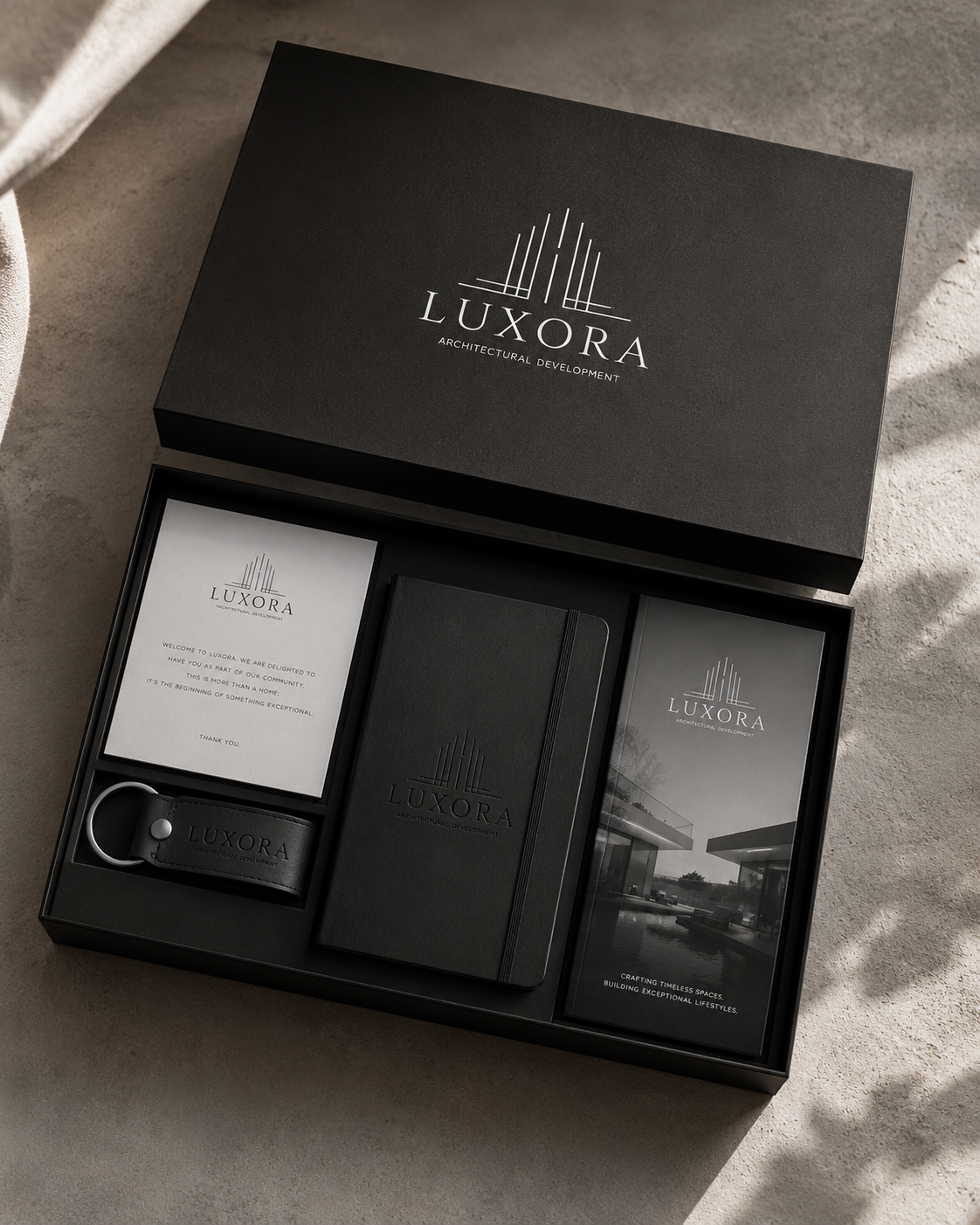 LUXORA welcome-home gift box - card, notebook, keyring and brochure